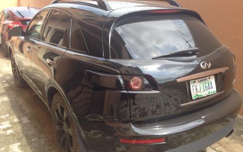 2005  features: fx 45 for sale Nigeria used LEATHER SEAT  DVD/FM,6 CD CHANGER  NAVIGATION SYSTEM  REVERSE CAMERA  ALLOY WHEELS  AUTOMATIC TRANSMISSION  FACTORY FITTED AC  POWER DOORS  POWER WINDOWS  AUTOMATIC BRAKING SYSTEM.  LOW MILEAGE : 83064  SRS AIRBAGS INTACT.  V8 ENGINE.  SPARE TYRE  CENTRAL LOCK  Its in a perfect condition. Price: #1.9m asking price.